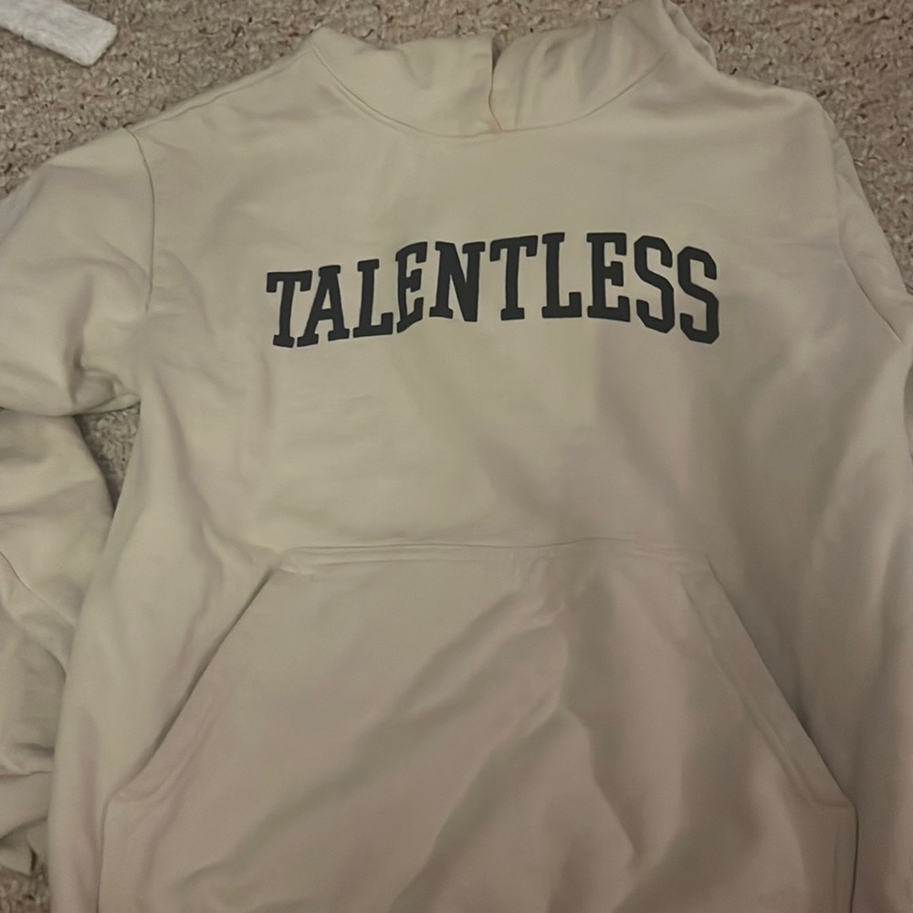 Cream talentless sweatshirt. Navy blue velvet writing